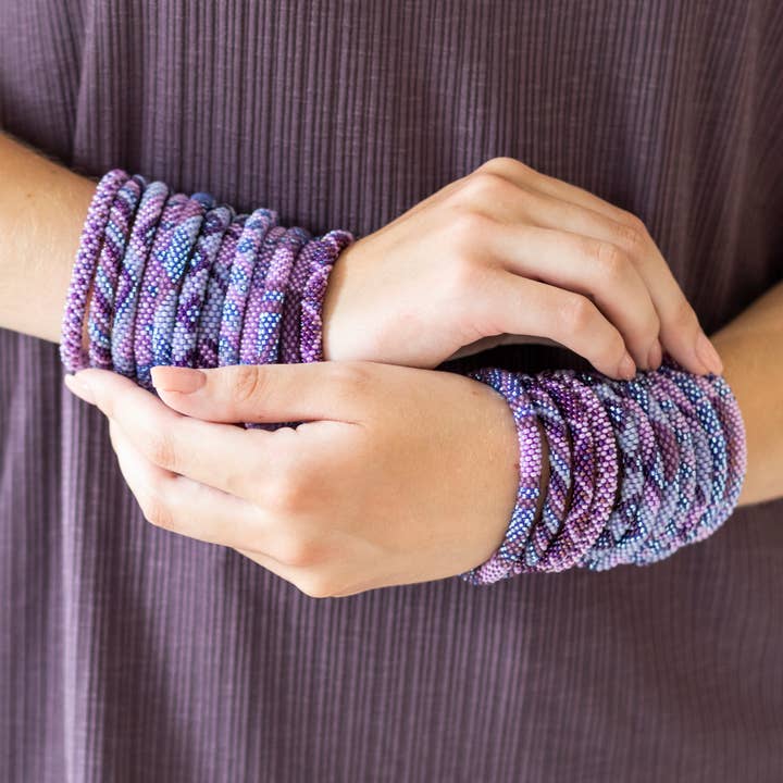 Aid Through Trade - Wholesale Jewelry Set - The Original Roll-On® Bracelet Amethyst - Set of 12