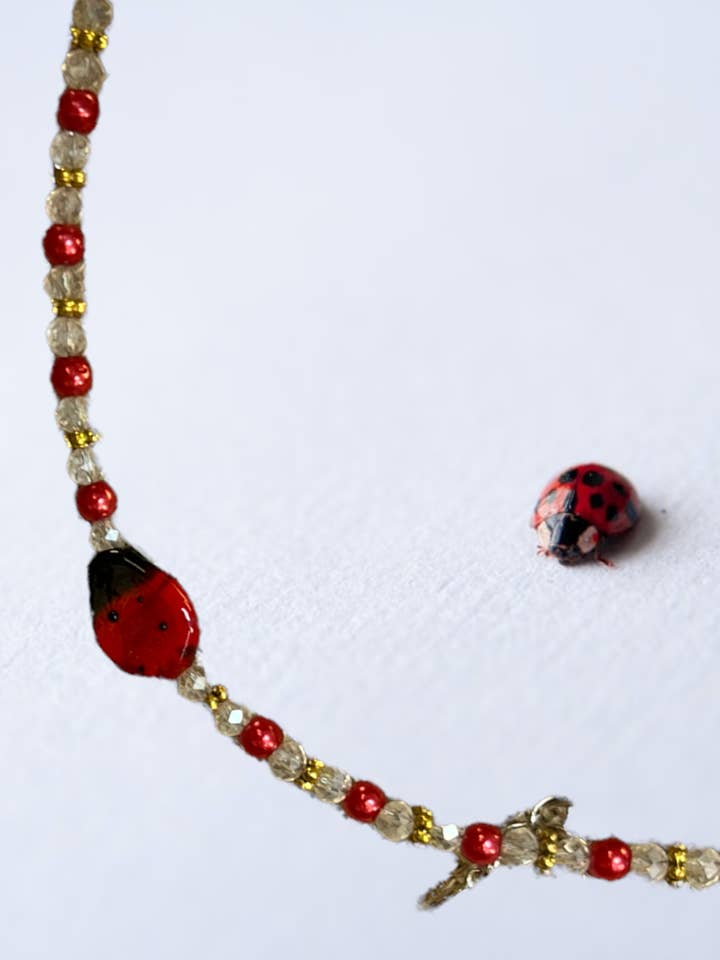 Bracelet coccinelle perlée pour la vente par Ciao Bella Jewelry Inc
