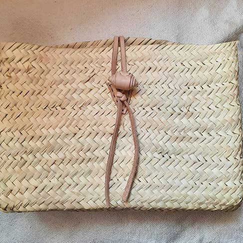 Moroccan straw clutch with leather for wholesale by MARRAKECH METACRAFT LTD