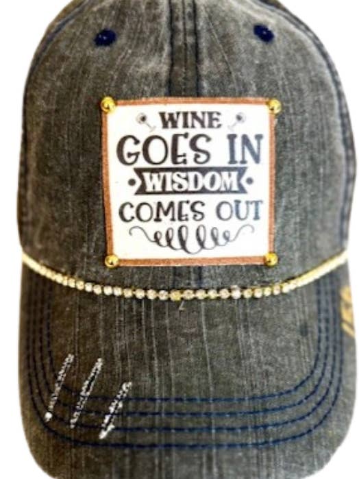 (#156)"WINE GOES IN WISDOM COMES OUT" DISTRESSED TRUCKER HAT for wholesale by Jana's Flannels
