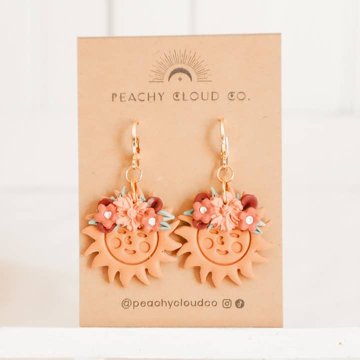 Blommiga soliga Huggies för wholesale av Peachy Cloud Co.