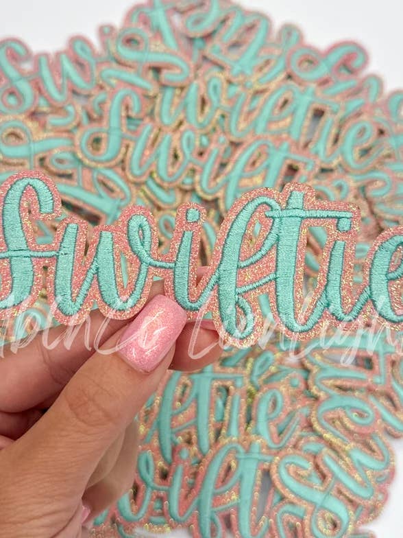 swiftie turquoise cursive script letter patch iron on for wholesale by ABLNco