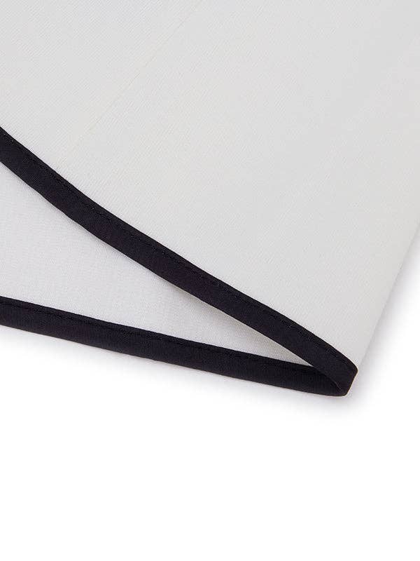 PRETO BRANCO Casaco de gola alta com manga longa, corte solto, estampa floral em cores contrastantes e abertura lateral para venda a revendedores na Faire14