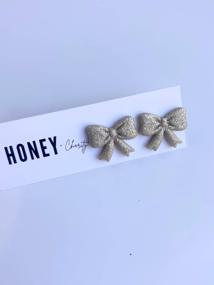 Gold Sparkle Bow Studs for wholesale by Honey & Charity Earrings