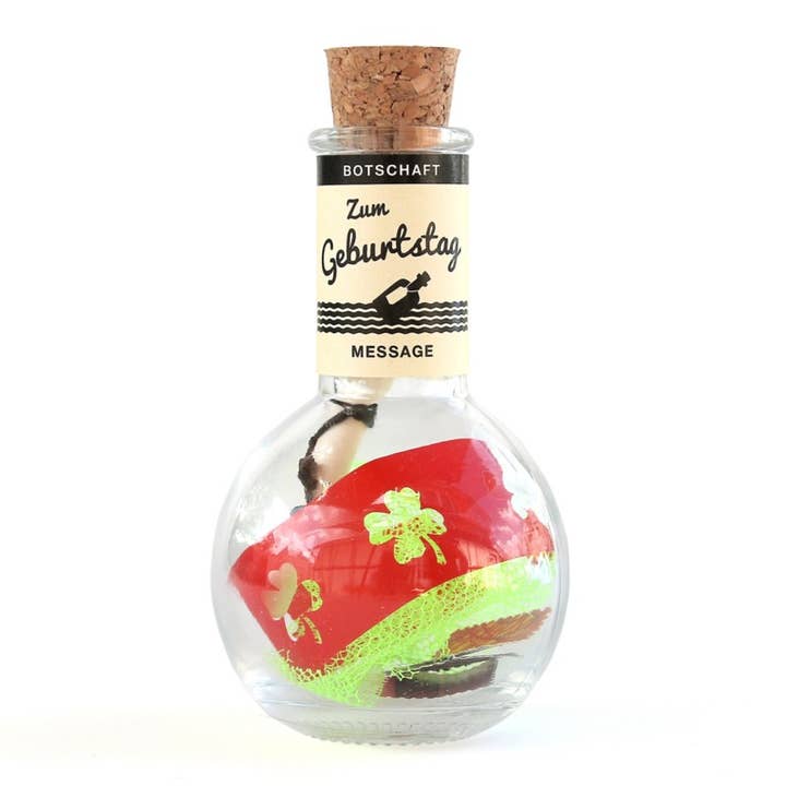 Messaggio «Happy Birthday» in una bottiglia per la vendita all'ingrosso da parte di Dr. P. Lacebo