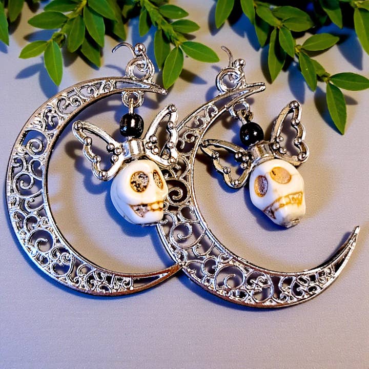 Earrings, Half Moons with Howlite Skull and Hematite for wholesale by Funky Aura Boutique