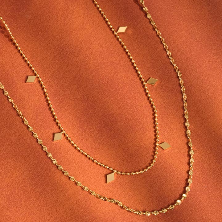 Arômes 18K Gold Non-Tarnish Layered Tassel Necklace for wholesale on Faire