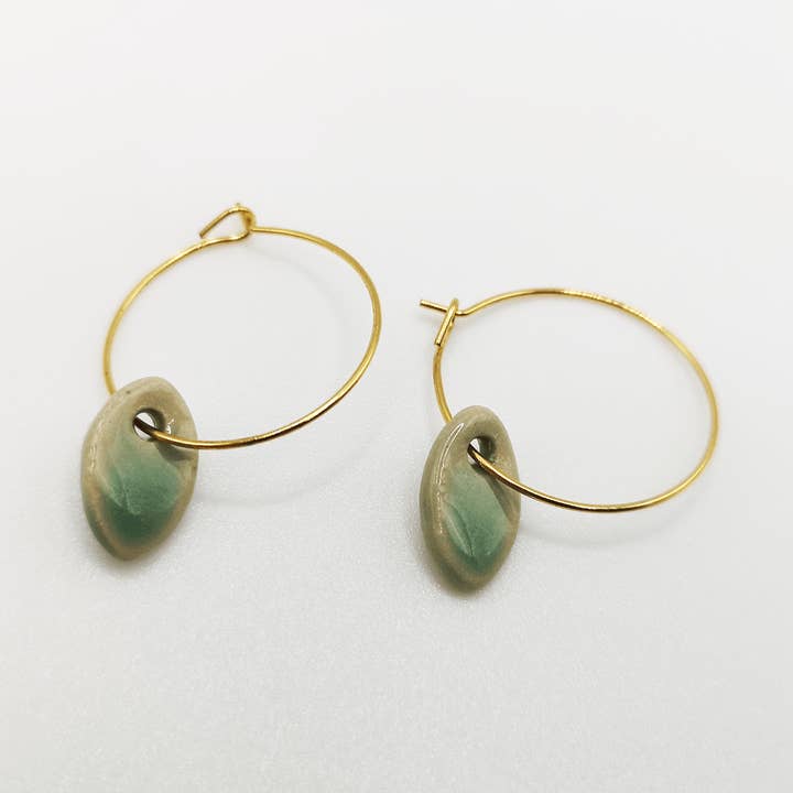 Boucles d'oreilles vert Feuille Petite and other Purchase Wholesale intimo corinne. Free Returns & Net 60 Terms on Faire trending on Faire.