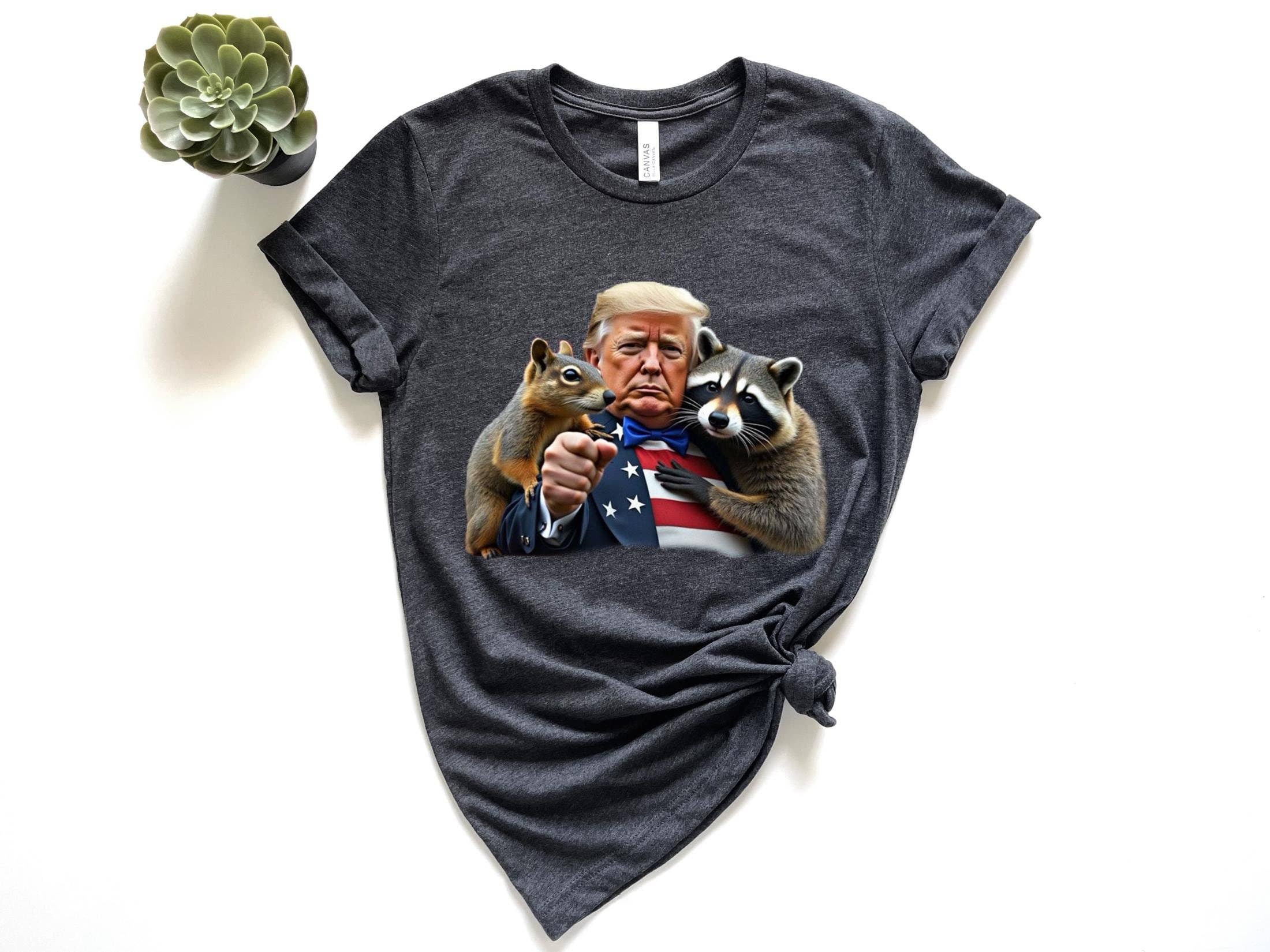 NVC Ecommerce LLC – wholesale T-shirt (graphic) – women's – Trump Peanut Squirrel Raccoon Sweatshirt, Funny Trump  Shirt4