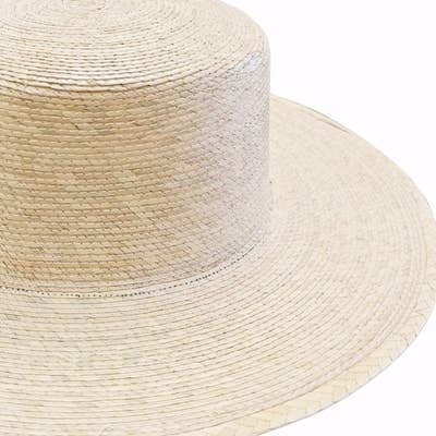 NATURAL Structured palm leaf gaucho or boater hat for wholesale on Faire1