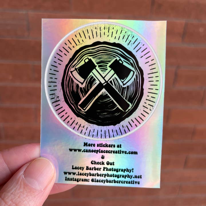 Mountain Axe Sticker - Axe Throwing Vinyl Holograph Sticker for wholesale by Canoe Place Creative