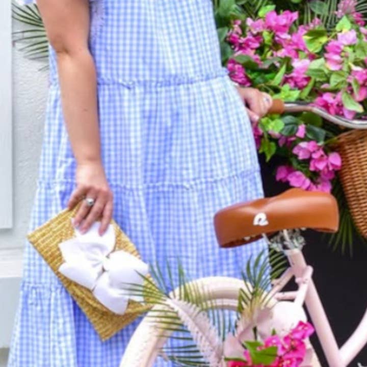 Vineyard Straw Clutch with White Bow for wholesale by Peachy Pendants