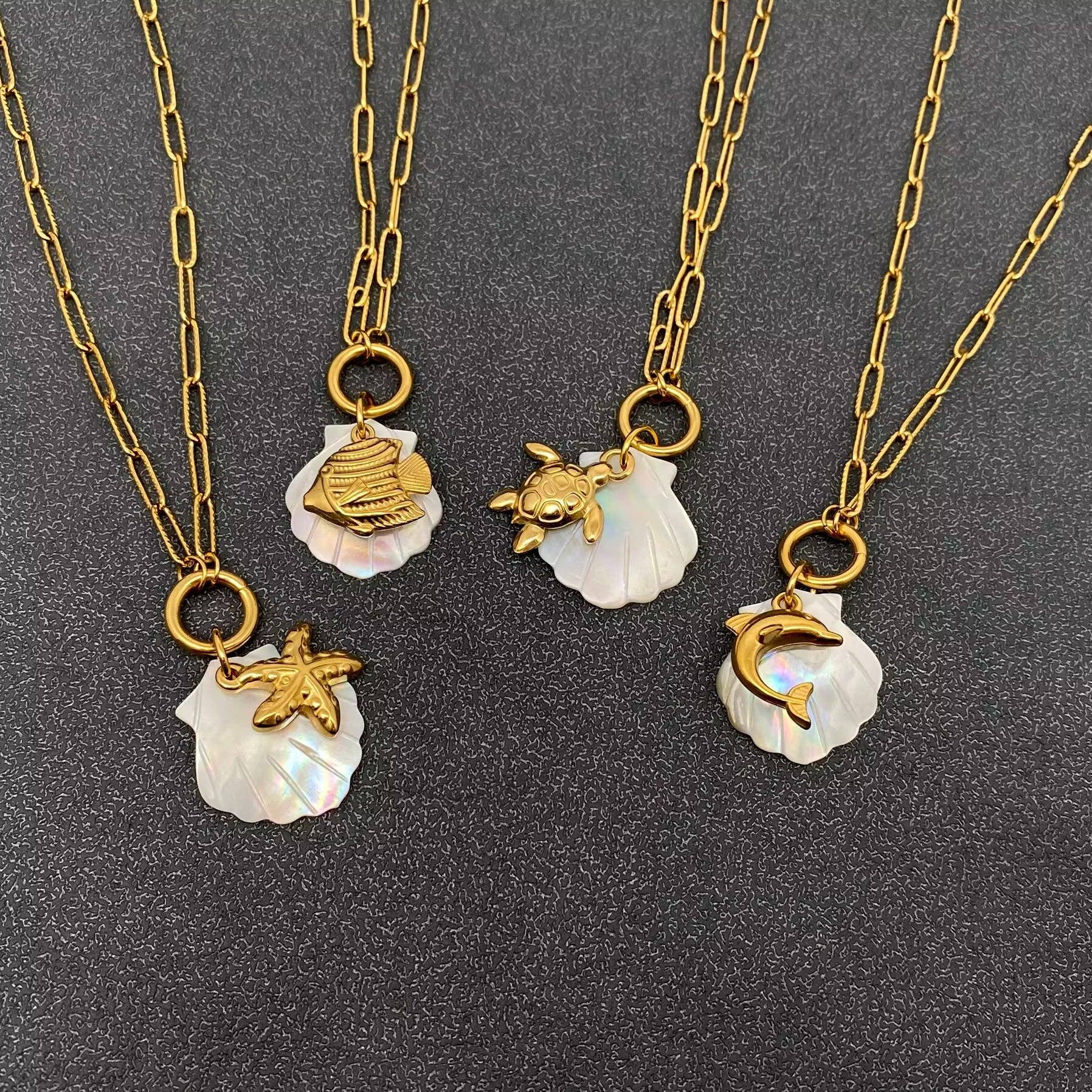 Mio Queena - Wholesale Pendant/Charm Necklace - Ocean Style Shell & Fish Charm 18K Golden SS Necklace - FGS3