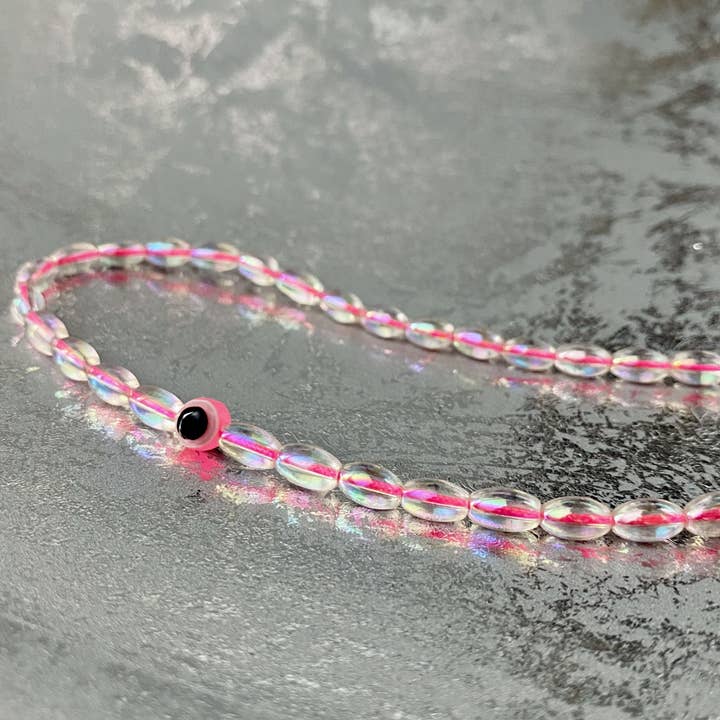 Neonrosa Telefonanhänger für den Großhandel von Atypiquement