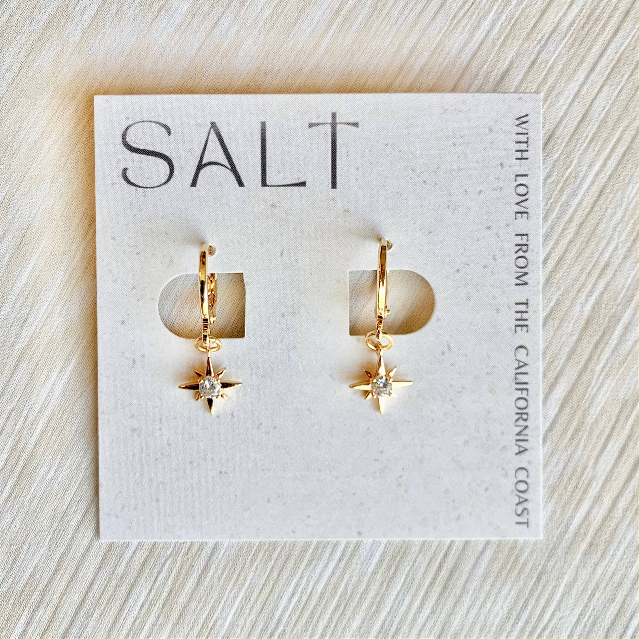 SALT by Sarah Curtis - Wholesale Huggie Earrings - STARBURST HUGGIE HOOPS | gold | star charm earrings