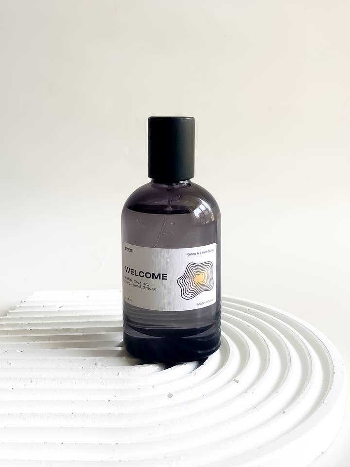 Coconut + Amber Room and linen Spray 3.2 oz. Welcome for wholesale by By Odiri