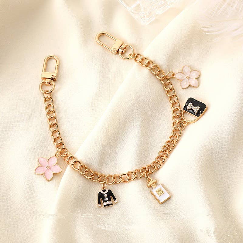 Gold BAG CHARM-CHAIN TOP BAG FLOWER PERFUME | 40KC120 for wholesale on Faire3