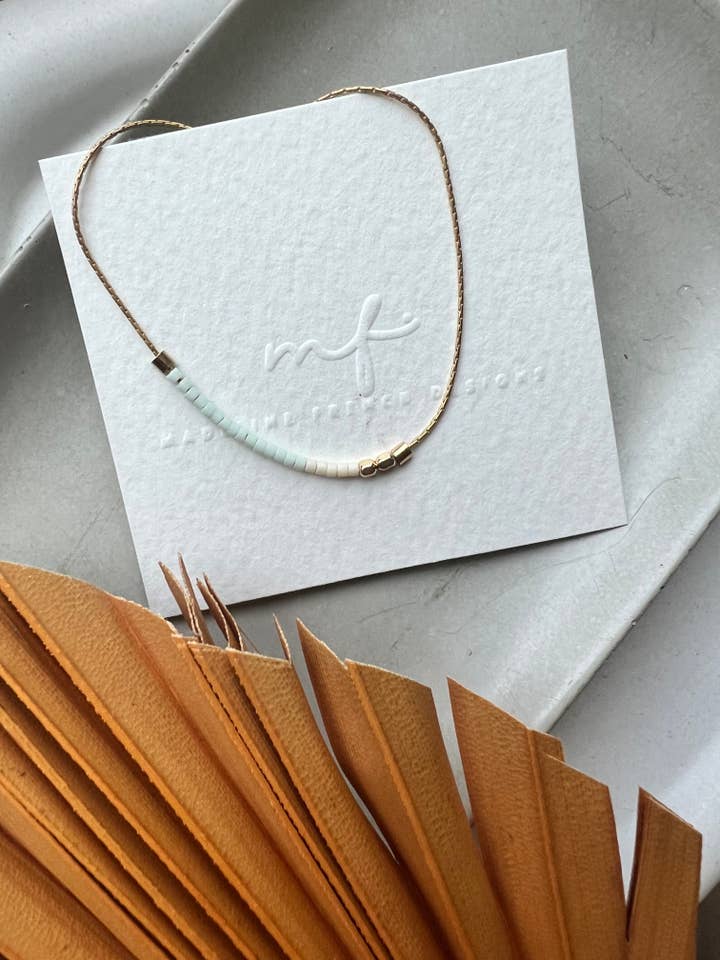 the original- tiny beaded necklace for wholesale by Madeline French Designs