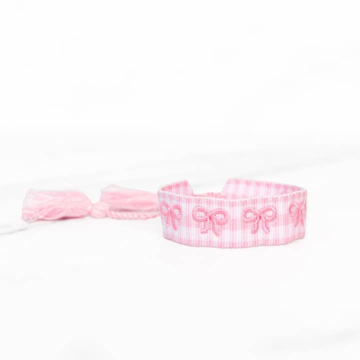 Tassel Bracelet | Delicate Pink Bows for wholesale by Golden Thread