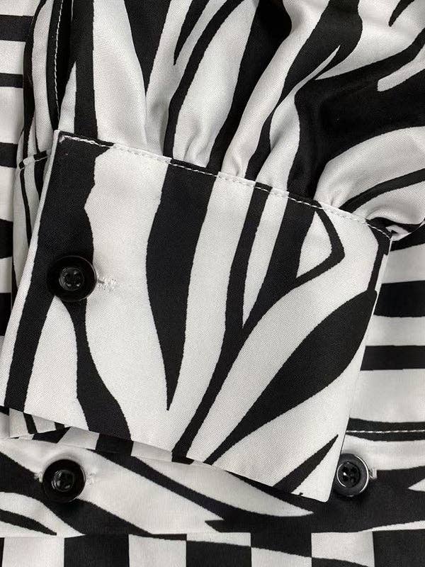 NERO BIANCO Abito lungo a quadri con bottoni e cintura annodata in vendita all'ingrosso su Faire6