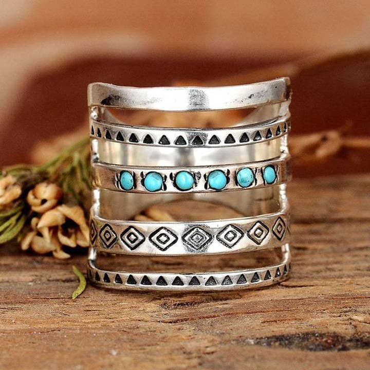 Bohemian Carved Hollow-out Turquoise Ring and other Purchase Wholesale event centerpieces. Free Returns & Net 60 Terms on Faire trending on Faire.