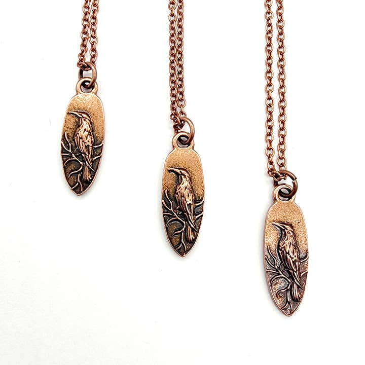 Antique Copper Whispering Raven Pendant Necklace for wholesale by MergingMetals