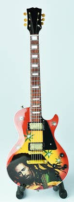 Ocean Peak Australia and New Zealand Pty Ltd - Wholesale Decorative figurine - Miniature guitar Bob Marley0