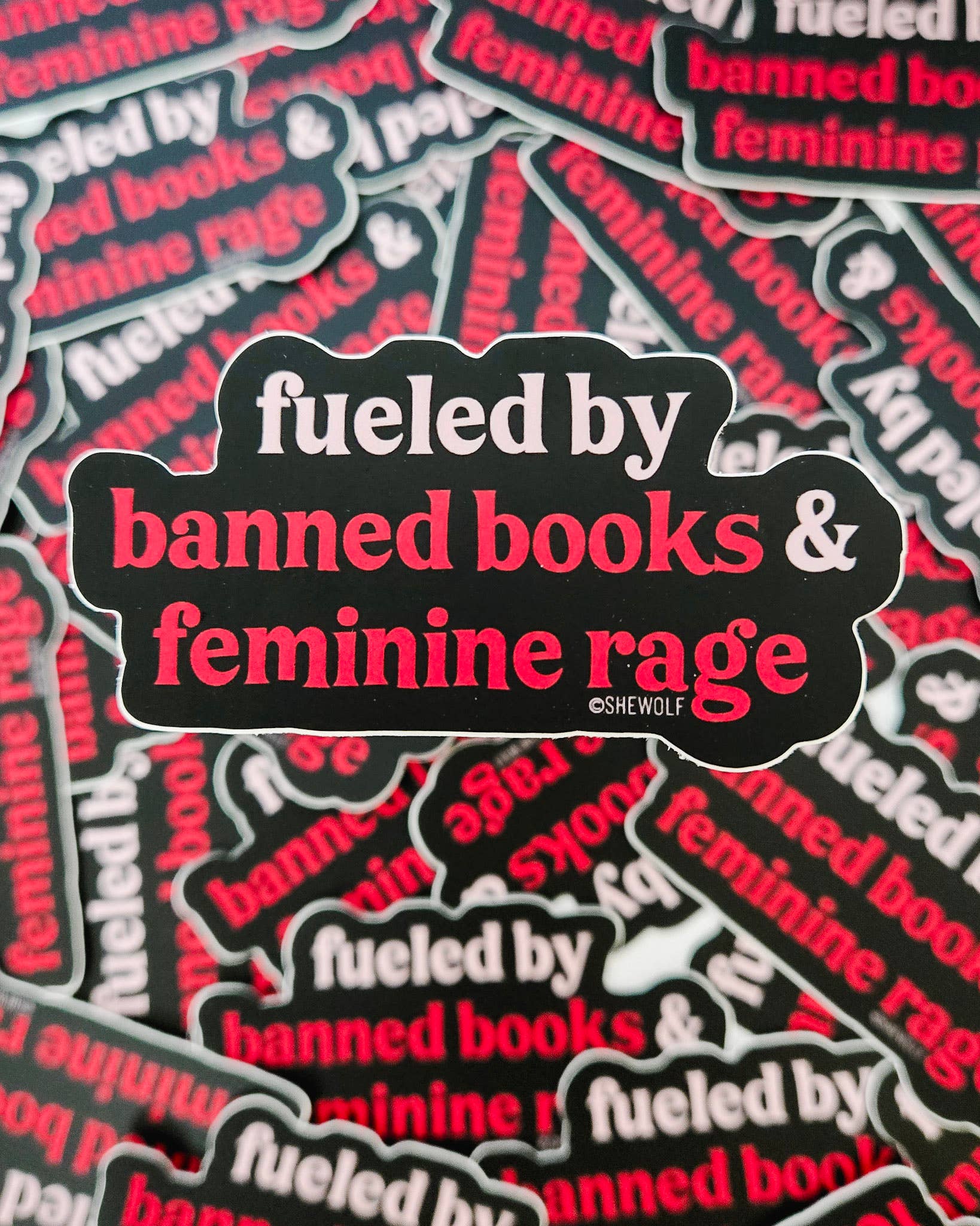 SHEWOLF Designs - Wholesale Sticker - Sticker: Fueled by Banned Books & Female Rage - Bold & Fun2