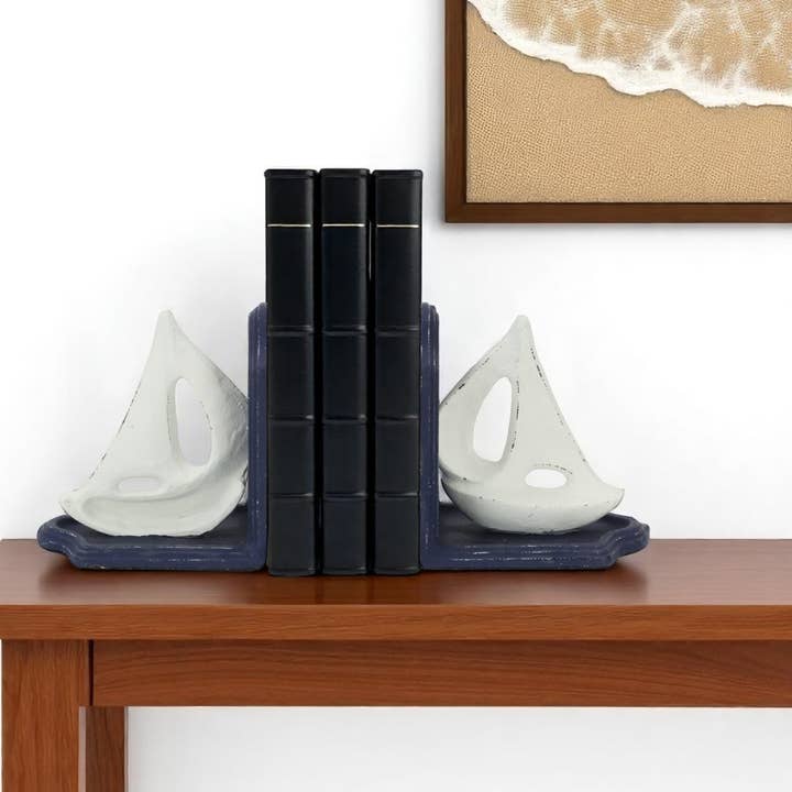 Set of Two 5" Blue And White Cast Iron Sailboat Bookends for wholesale by HomeRoots