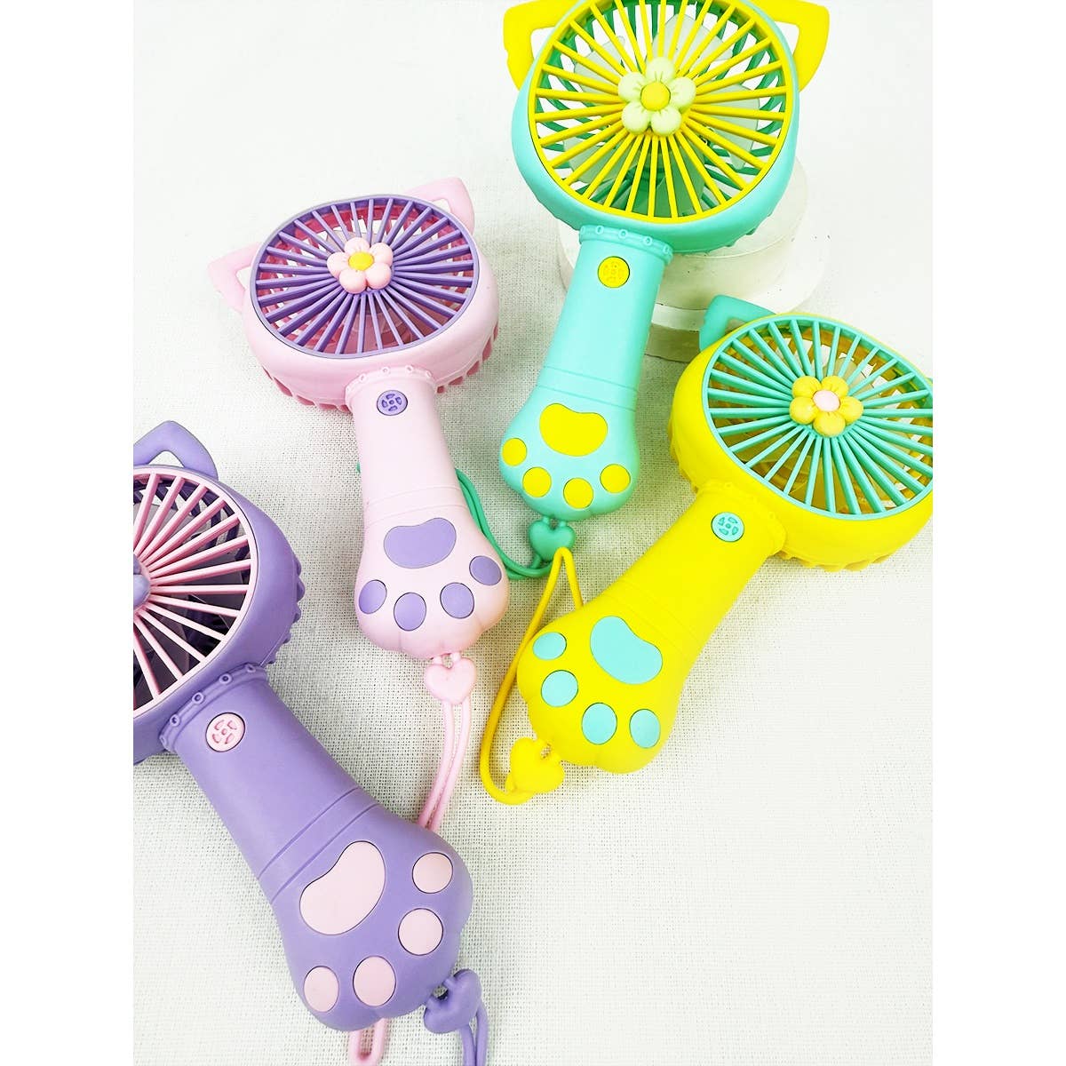 MIX COLOR Cute Paw Portable Hand Fan with strap for wholesale on Faire8