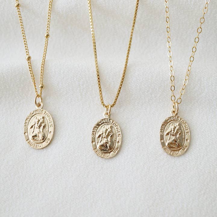 St. Christopher Traveler's Protection Gold Coin Necklace and other Purchase Wholesale christopher. Free Returns & Net 60 Terms on Faire trending on Faire.