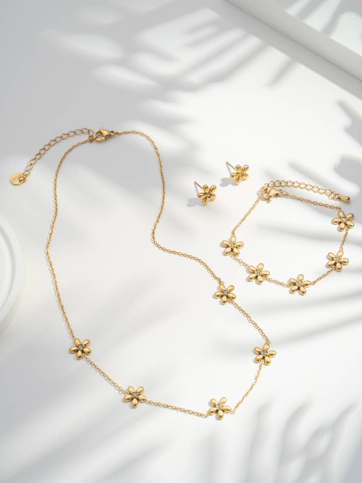 Stainless steel flower set: necklace, bracelet, earring for wholesale by COSMOS