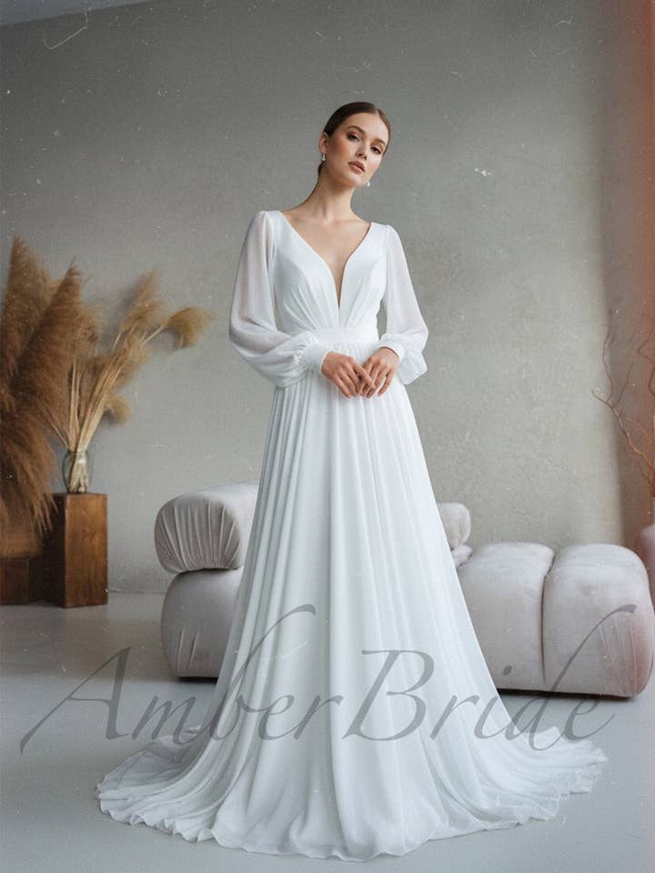 Elegant Flowy Chiffon Wedding Dress with Long Puffy Sleeve and Open Back for wholesale by Amber Commerce Group, MB