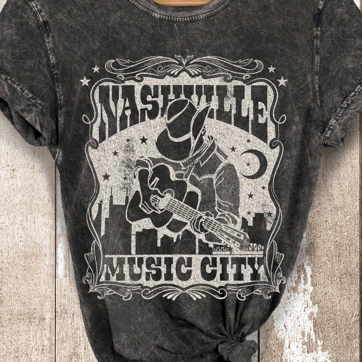 BT1693-MT NASHVILLE - Vintage Mineral Graphic Print Top and other Purchase Wholesale team apparel. Free Returns & Net 60 Terms on Faire trending on Faire.