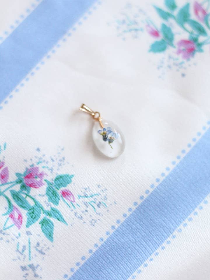 Oval pendant- forget me nots for wholesale by Chantelle Nicole Jewelry