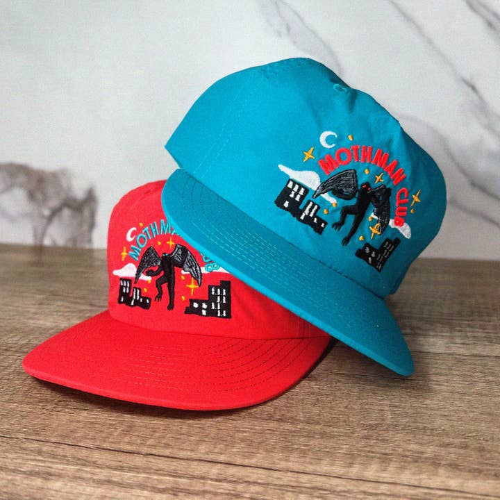 The Space Bureau - Wholesale Trucker Hat - Unisex - Mothman Cryptid Club Surf Hat