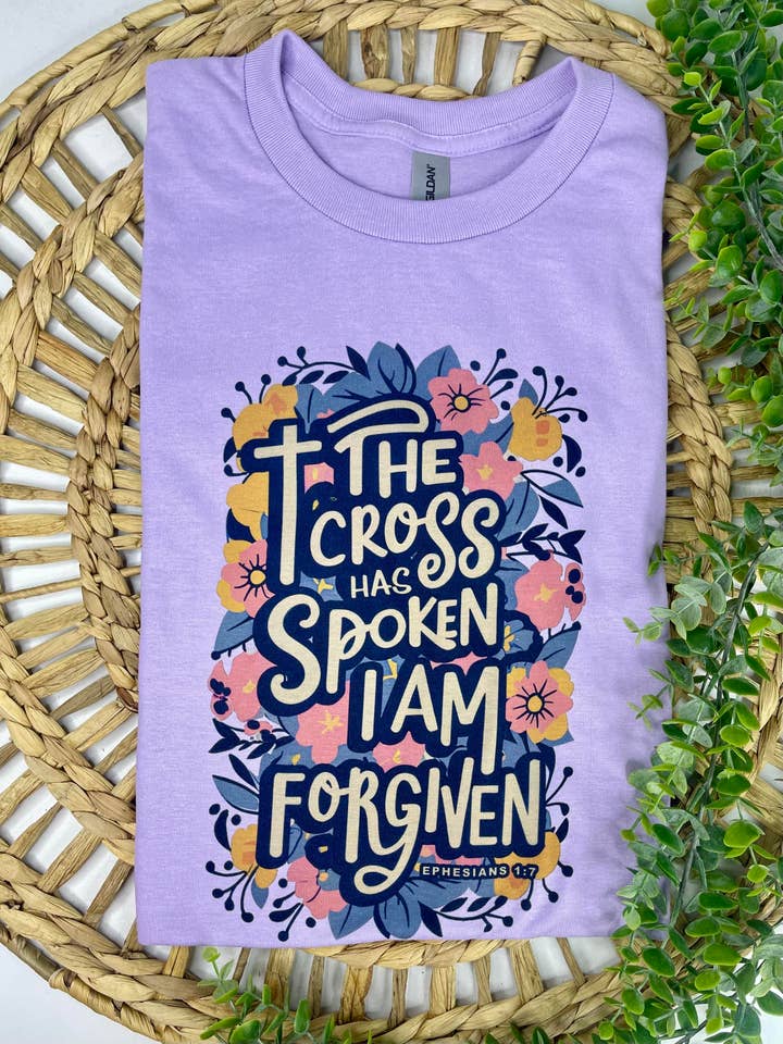 Gildan Lilac The cross has spoken I am forgiven (T-Shirt) for wholesale on Faire
