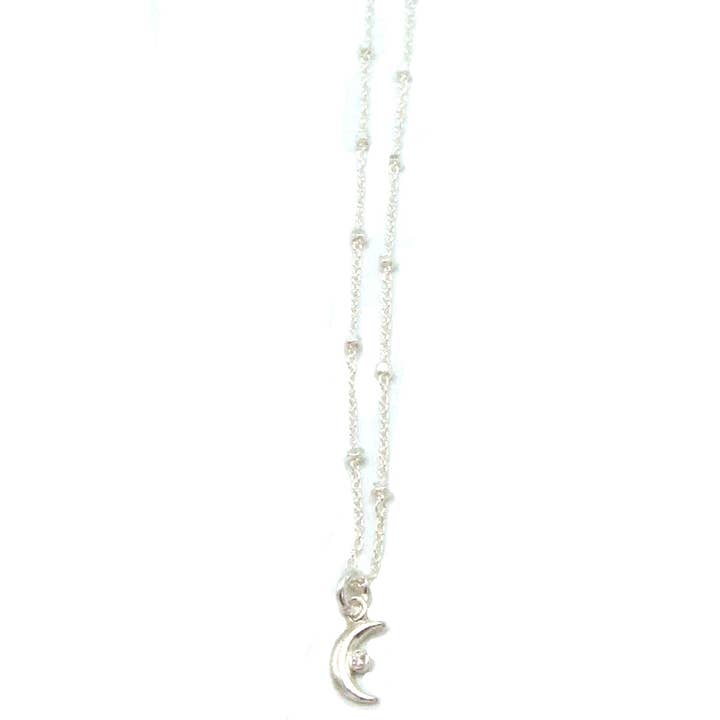 Sterling Silver Tiny Moon Necklace with CZ for wholesale by Jessica Elliot Jewelry