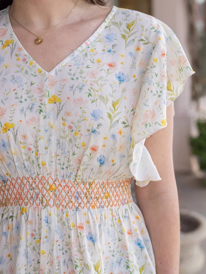 Smocked Flutter Sleeve Top in Watercolor Floral for wholesale on Faire