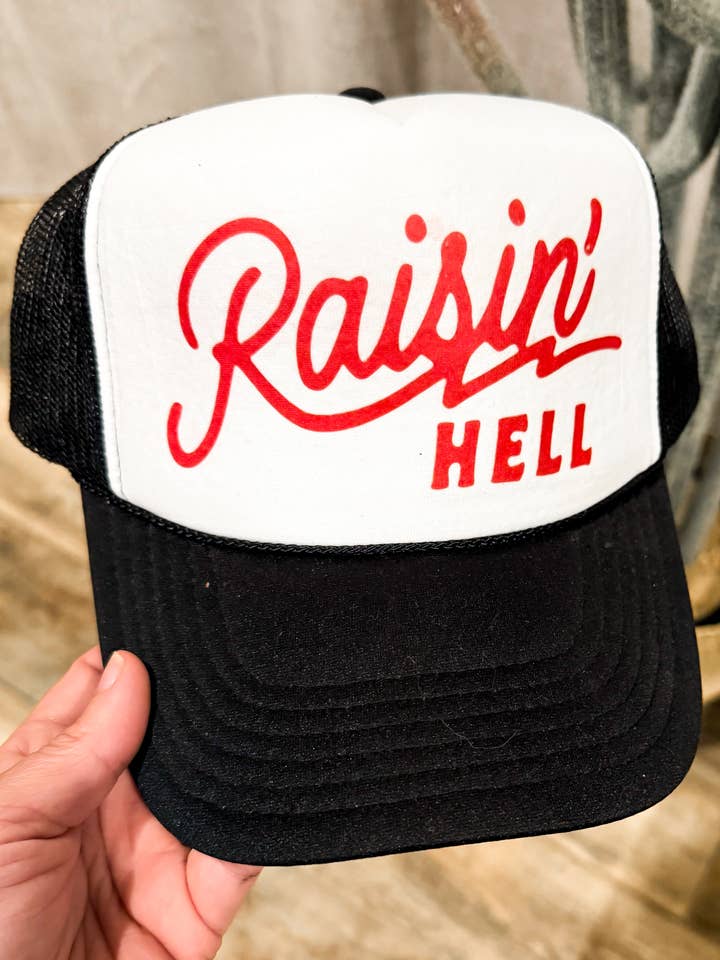Raisin’ Hell Trucker Hat for wholesale by The Prickly Five