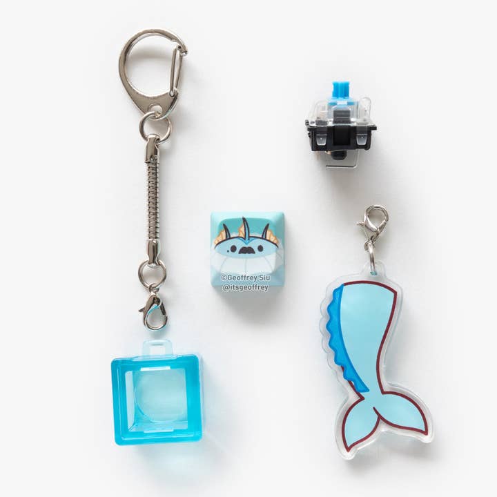 Geoffrey Siu Art LLC - Wholesale Sleutelhanger - Uniseks - Teaveelution Clicky Sleutelhangers