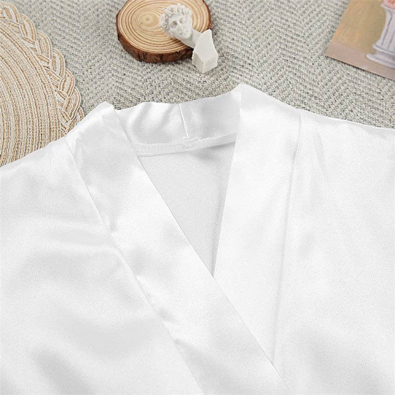 BLANC Ensemble 2 pièces : mini-robe à bretelles spaghetti et pyjama à manches plumes en vente sur Faire6