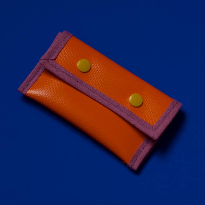 I Upcycling I Coucou LKW push buttons wallet - Orange & Lila for wholesale by Pikto3000