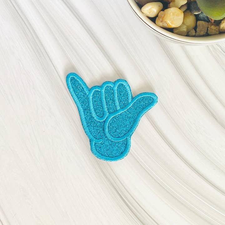 Glitter Shaka hand sign embroidered hat patch for wholesale by R & R Stitched