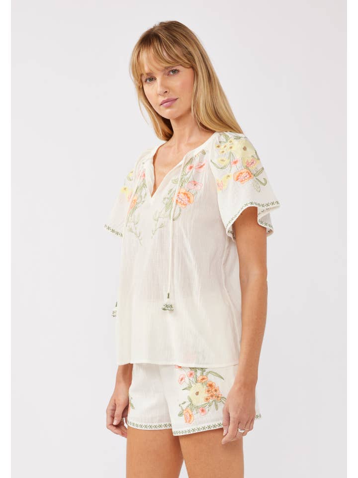 Cream Coral Floral Embroidery Split Neck Short Sleeve Top for wholesale on Faire