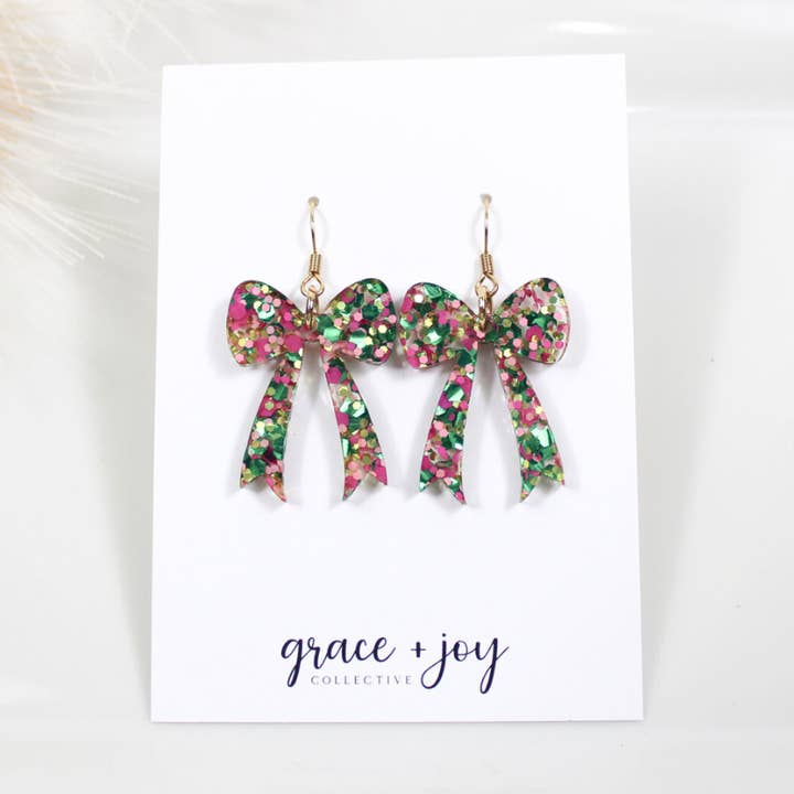 Wicked Pink and Green Bow Dangle Earring, Good Witch earring for wholesale by Grace + Joy Collective