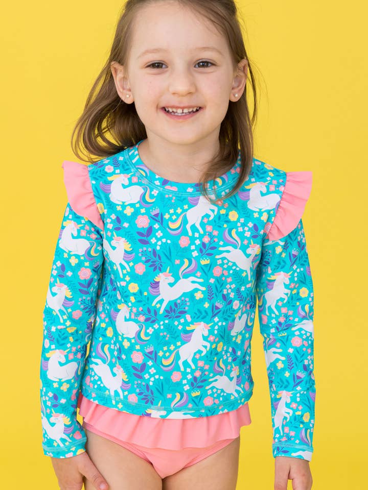 Girls Bright Aqua Unicorn Meadow Flutter Long Sleeve Rash Guard Skirted 2-Piece Swimsuit
for wholesale by RuffleButts + RuggedButts