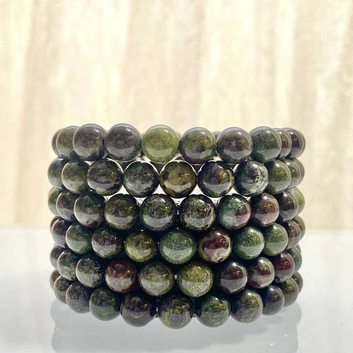 Dragon Blood Bracelets 8mm 7.5” Healing Crystal Stretch Brac for wholesale by KayleeNYC