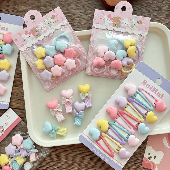 Collezione di 5-10 Versatili Fermagli e Elastici per Capelli con Motivo a Cuore e Stella Carini per la vendita all'ingrosso da parte di MyKids-USA®