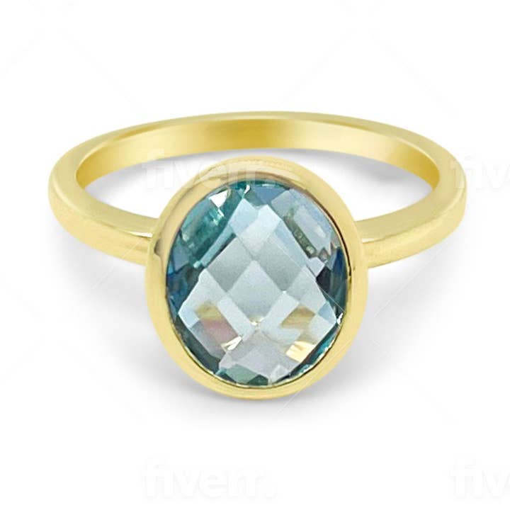 Bague en or jaune 14k avec pierre précieuse topaze bleue sertie de Meira T pour la vente par Meira T